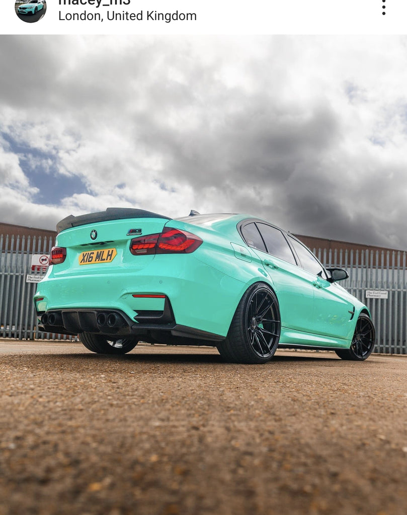 Green BMW M3 F80 with some hex shaped 4D plates