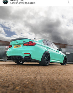 Green BMW M3 F80 with some hex shaped 4D plates