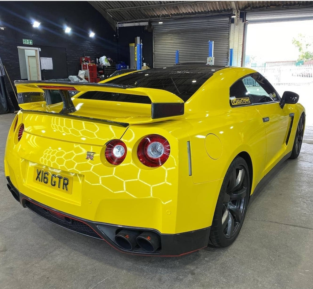 Bumblebee yellow Nissan GTR with some road legal 3D gel plates