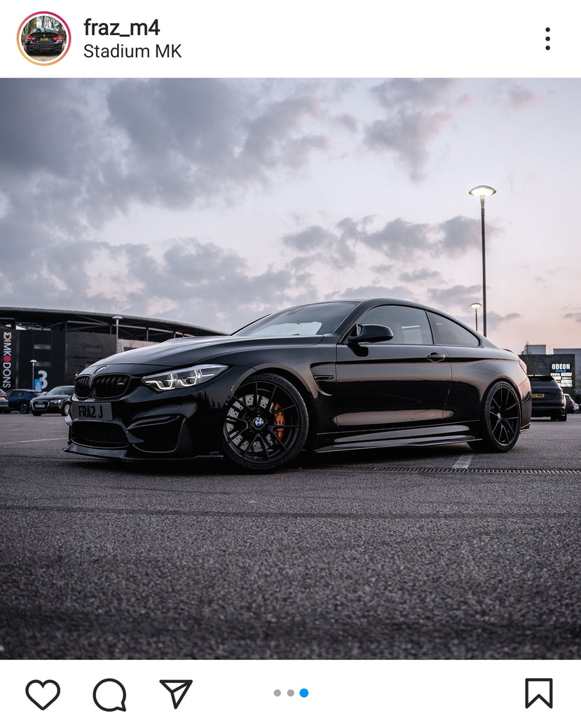 Blacked out BMW M4 with some short tinted 3D gel plates
